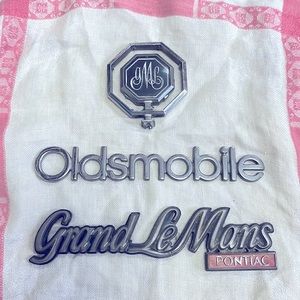 Vintage auto hood and body ornaments